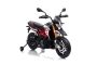 Moto électrique APRILIA DORSODURO 900, avec licence, batterie 12V, roues souples EVA, moteurs 2 x 18W, suspension, cadre en métal, fourche en métal, roues auxiliaires, rouge