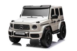 Voiture électrique pour enfants Mercedes-Benz G63 AMG 4x4² Biplace 12V, blanc, Lecteur MP3 avec entrée USB/AUX, Conduite 4x4, Batterie 12V14Ah, Roues EVA avec suspension, Sièges en similicuir, Télécommande, Licence